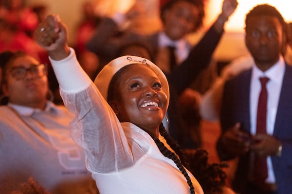 An audience member dances to music before Vice President Kamala Harris speaks to students at Morehouse College in Atlanta on Tuesday, September 26, 2023. (Arvin Temkar / arvin.temkar@ajc.com)