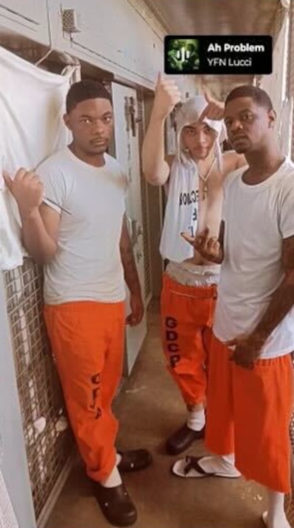 District Attorney T. Wright Barksdale III of the eight-county Ocmulgee Circuit in Middle Georgia said that days after Shane Tassi (center) was convicted at trial for murdering a high school student, local law enforcement spotted a social media post showing a picture of Tassi in prison holding a homemade shank and making a gesture suggesting his gang affiliation. (Ocmulgee Judicial Circuit District Attorney's Office)