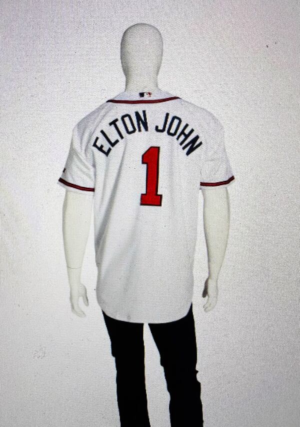 A personalized Atlanta Braves Elton John jersey is being auctioned as part of a trio of Braves clothes the singer is auctioning off Feb. 21 at Christie's. CHRISTIE'S