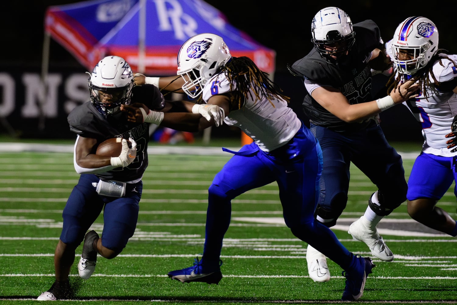 Norcross's Kevin Maven-Winchester runs the ball. (Jamie Spaar for the Atlanta Journal Constitution)