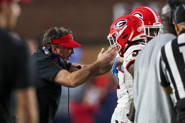 Georgia head coach Kirby Smart talks with Georgia running back Nate Frazier (3) after Frazier fumbled the ball for a turnover during the third quarter against Mississippi at Vaught Hemingway Stadium, Saturday, November 9, 2024, in Oxford, Ms. Mississippi won 28-10. (Jason Getz / AJC)
