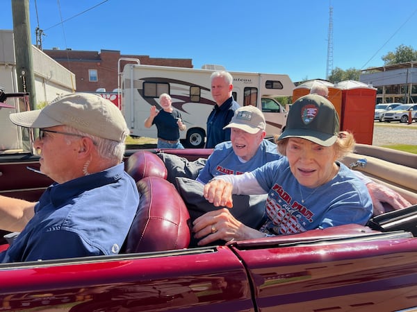 Former President Jimmy Carter and former First Lady Rosalynn Carter make their way through Plains for the annual Peanut Festival on Sept. 24 (Jill Stuckey)