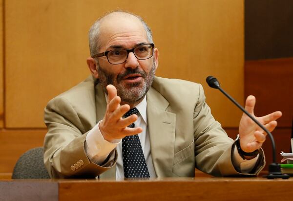 4/16/18 - Atlanta - Dr. Mark Pressman, a sleep disorder expert from Pennsylvania who also teaches at the Villanova School of Law testifies as a rebuttal witness during the Tex McIver murder trial at the Fulton County Courthouse on Thursday, April 12, 2018. Bob Andres bandres@ajc.com