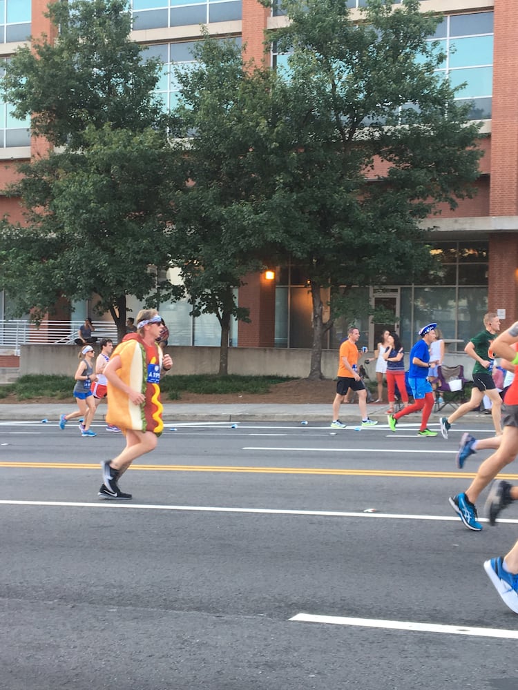 Runners show fashion flair during AJC Peachtree Road Race