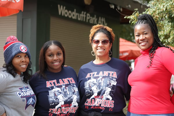 Braves fans (L-R) Gina Bacon, Java Hardge, Shimira Johnson, Lamarra Finley attended the Braves' World Series celebration parade in Atlanta on Nov. 5, 2021. (Photo by Anfernee Patterson/AJC)