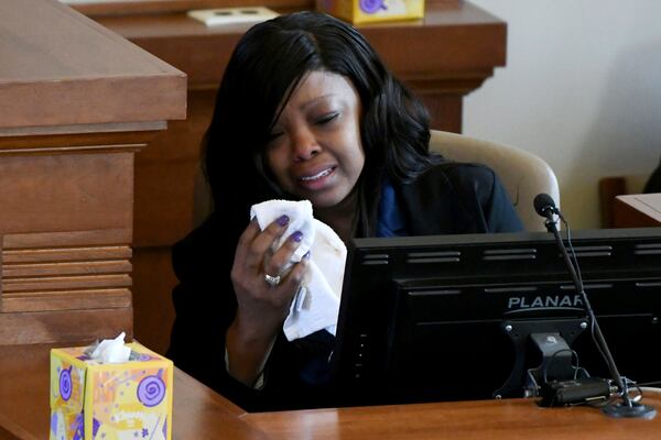 Stephanie Lee, mother of University of Mississippi student Jimmie "Jay" Lee, cries as she testifies at the trial of Sheldon Timothy Herrington Jr., who is on trial on a capital murder charge in the 2022 death of Jay Lee, in Oxford, Miss. on Tuesday, Dec. 3, 2024. (Bruce Newman/The Northeast Daily Journal via AP, Pool)