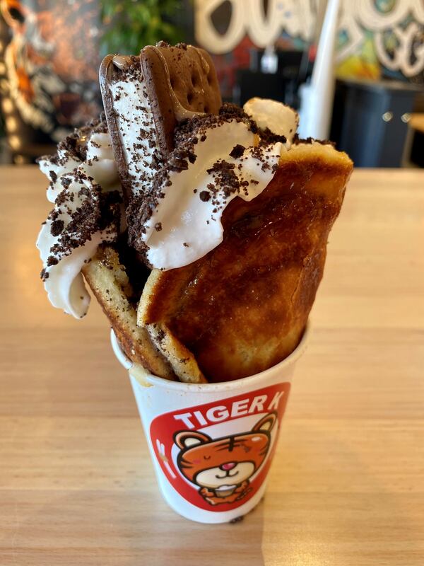 Tiger K Cupbob offers 20 versions of hotteok (ho dduk), a pancake with cinnamon, brown sugar and butter, served in a cup. This is the ice cream version. Wendell Brock for The Atlanta Journal-Constitution