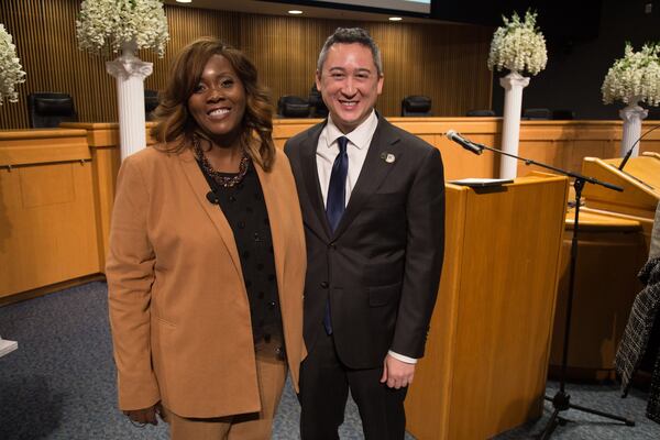 Marlene Fosque (L) and Ben Ku pose for a photograph at the Gwinnett Justice and Administration Center in Lawrenceville GA. Fosque and Ku were both sworn in as Gwinnettâ€™s newest County Commissioners Friday night. STEVE SCHAEFER / SPECIAL TO THE AJC