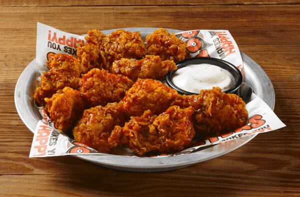 If you're single, Hooters has a deal for you -- shred a photo of your ex for free wings. PHOTO / hooters.com