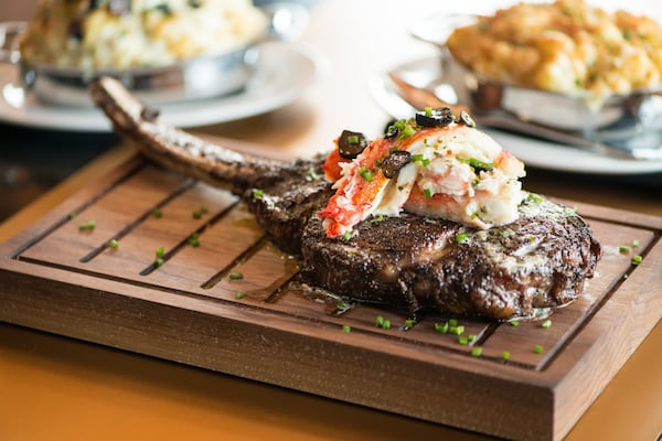 Del Frisco's Double Eagle Steakhouse  Long- Bone Ribeye Wagyu Steak with crab. Photo credit- Mia Yakel.