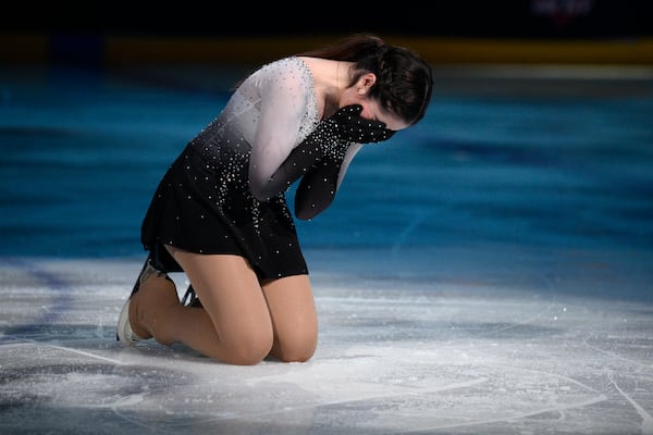 Isabella Aparicio reacts after her performance Sunday, March 2, 2025, in Washington, at the Legacy on Ice event, a figure skating tribute to support the families and loved ones affected by the Jan. 29 aviation incident. (AP Photo/Nick Wass)