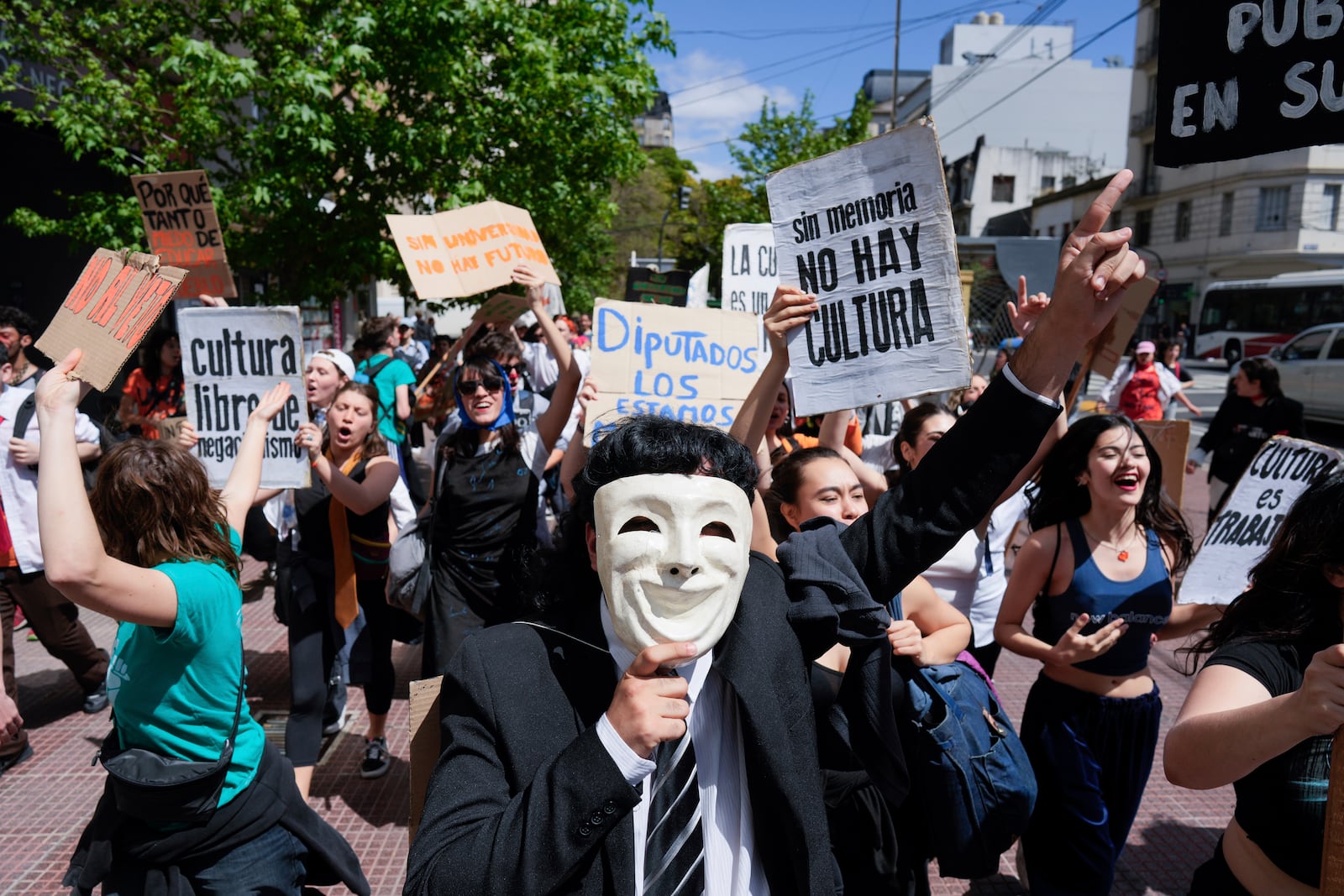 Students march to Congress to protest President Javier Milei's veto of a law to increase funding for public universities in Buenos Aires, Argentina, Wednesday, Oct. 9, 2024. (AP Photo/Rodrigo Abd)