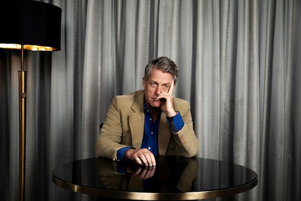 FILE - Hugh Grant poses for a portrait to promote the film "Heretic," Oct. 27, 2024, in Los Angeles. (Photo by Rebecca Cabage/Invision/AP, File)