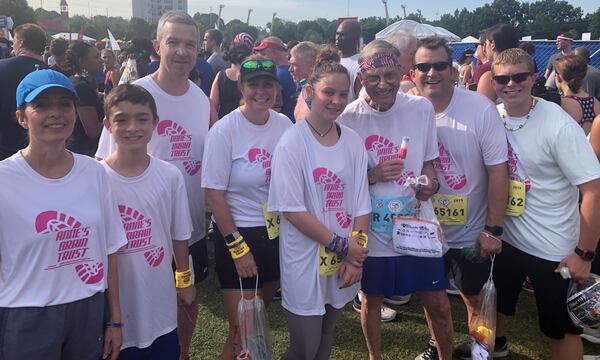 Richard Vincent (third from right) and his family after they finished the AJC Peachtree Road Race. They visited his wife, Anne, who's currently at Piedmont Atlanta Hospital fighting cancer, during the race.