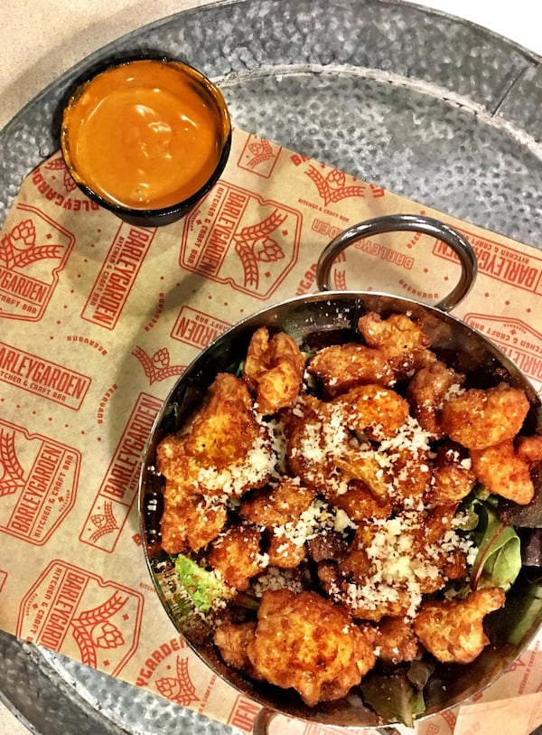 Fried cauliflower at Barleygarden is served with an addictive seasoning of paprika and Parmesan. CONTRIBUTED BY WYATT WILLIAMS