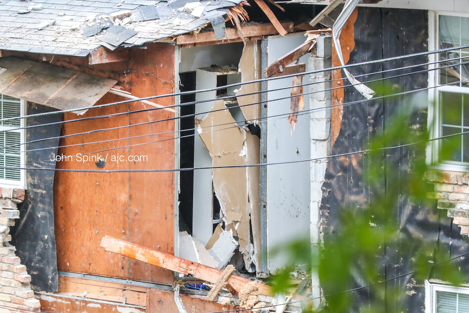 PHOTOS: Plane hits townhome complex in DeKalb County