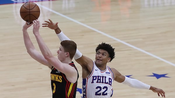 Hawks guard Kevin Huerter draws a foul from Philadelphia 76ers guard Matisse Thybulle on a three-point attempt with 54 seconds remaining in Game 7 of the Eastern Conference semifinals Sunday, June 20, 2021, in Philadelphia. Huerter made all three free throws, contributing to Atlanta's 103-96 win to advance to the conference finals. (Curtis Compton / Curtis.Compton@ajc.com)