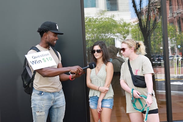 TikTok star Leon Ondieki plays a trivia game in Atlanta on Friday, July 22, 2022. (Natrice Miller/natrice.miller@ajc.com)