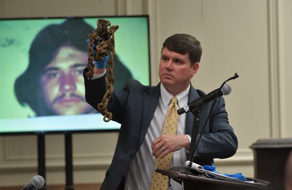 Benjamin Coker, district attorney for the Griffin Judicial Circuit, holds evidence as he makes closing arguments in the murder trial of Franklin Gebhardt at the Spalding County Courthouse on Tuesday, June 25, 2018. 