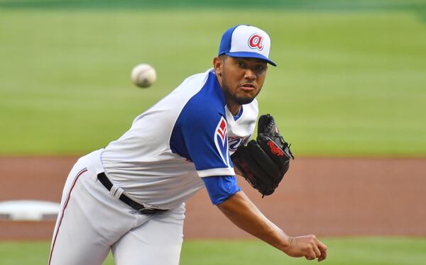 Braves starter Huascar Ynoa (19) delivers a pitch against Miami Marlins in the first inning at Truist Park on Monday, April 12, 2021.