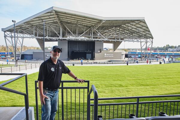 Macon Mayor Lester Miller at a preview opening of the city's new Atrium Health Amphitheater. (Courtesy of Macon-Bibb County, by Matt Odom.)