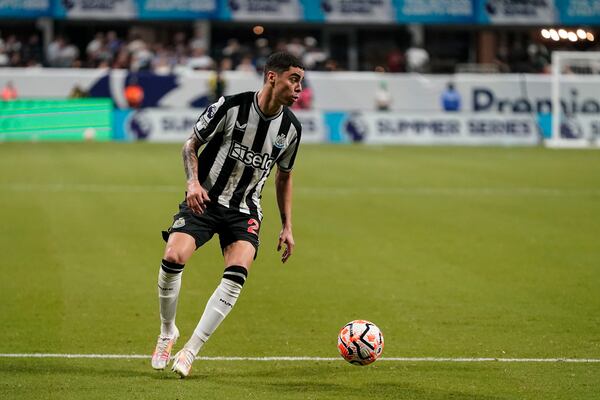 Newcastle's Miguel Almirón works with the ball before scoring a goal during a Premier League Summer Series soccer match against Chelsea on Wednesday, July 26, 2023, in Atlanta. (AP Photo/Brynn Anderson)