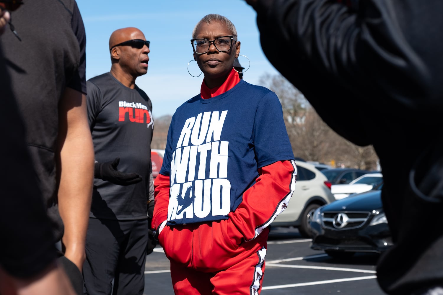 Andrea Ludaway waits for the start of the 2.23 mile Ahmaud Arbery Day Run in Atlanta on Sunday, Feb. 23, 2025, to mark the anniversary of the day Arbery was killed while out on a run near Brunswick.   Ben Gray for the Atlanta Journal-Constitution