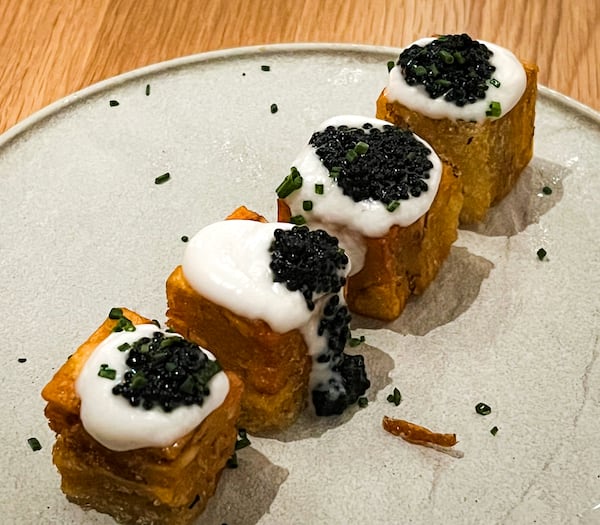 Planta serves its 1,000-layer potatoes with kelp-based "caviar." Henri Hollis/henri.hollis@ajc.com