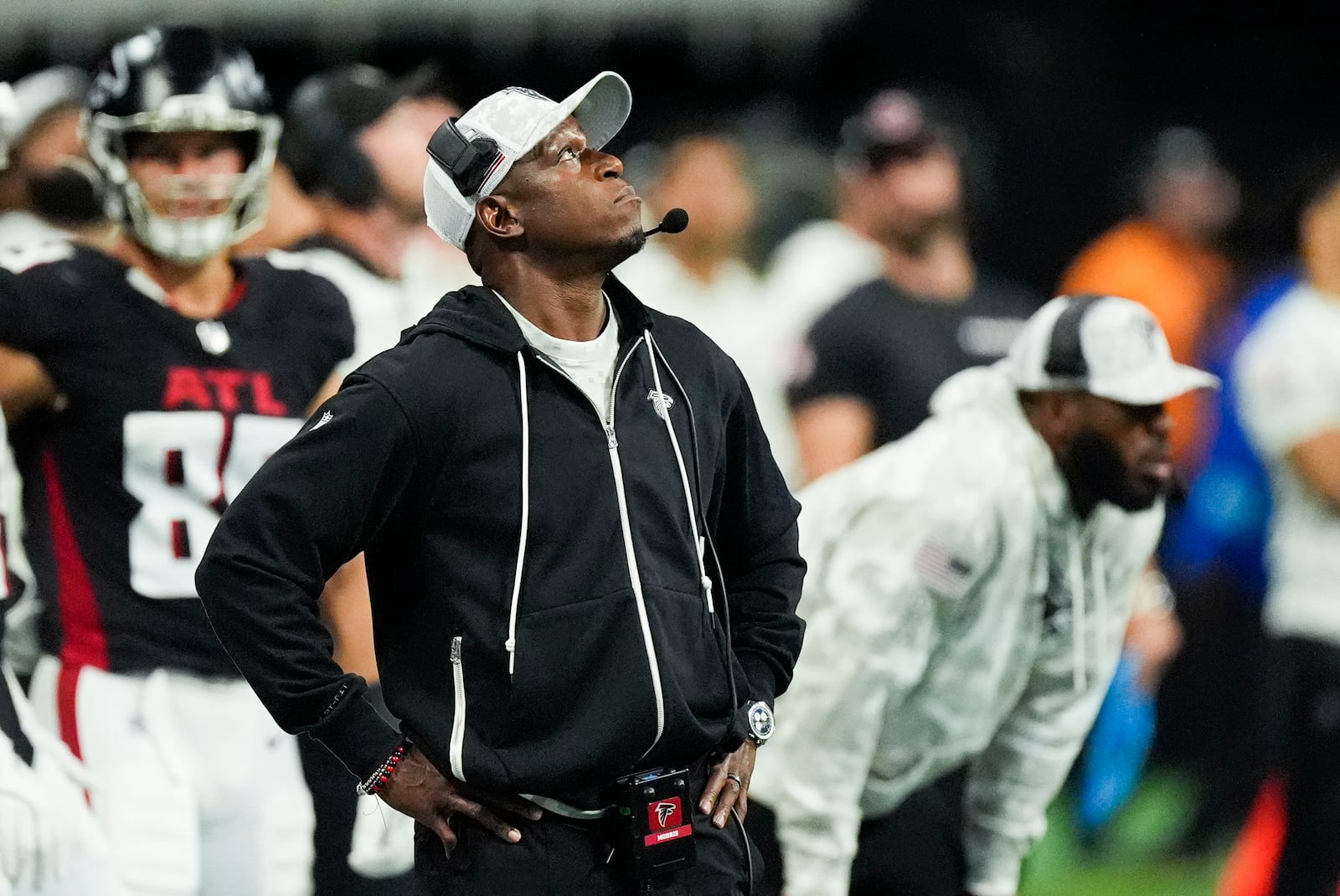 Atlanta Falcons head coach Raheem Morris looks up from the sideline during the first half of an NFL football game against the Dallas Cowboys, Sunday, Nov. 3, 2024, in Atlanta. (AP Photo/ John Bazemore)