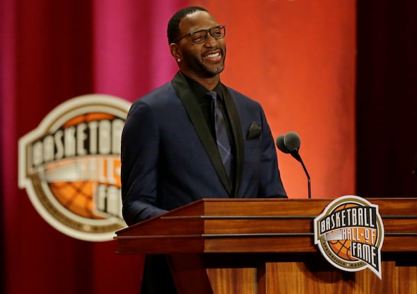 FILE - Tracy McGrady speaks during his enshrinement into the Naismith Memorial Basketball Hall of Fame, Friday, Sept. 8, 2017, in Springfield, Mass. (AP Photo/Stephan Savoia, FIle)