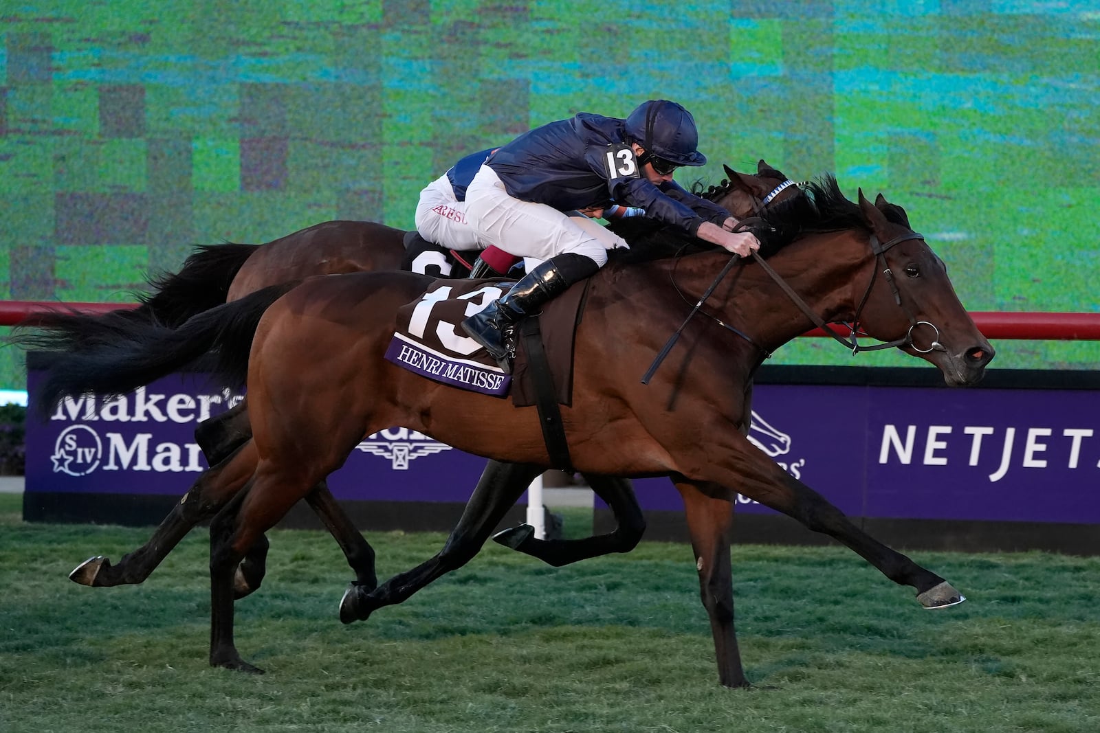 Ryan Moore rides Henri Matisse to victory in the Breeders' Cup Juvenile Turf horse race at Santa Anita Park in Del Mar, Calif., Friday, Nov. 1, 2024. (AP Photo/Gregory Bull)