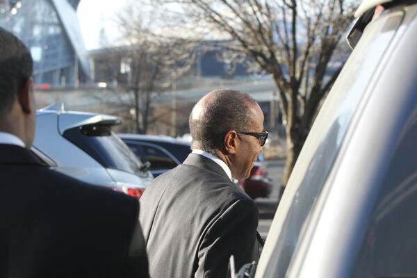 Elvin “E.R” Mitchell Jr. returns to his car after pleading guilty in the Atlanta City Hall bribery investigation on Wednesday, Jan. 25, 2017. (HENRY TAYLOR / HENRY.TAYLOR@AJC.COM)