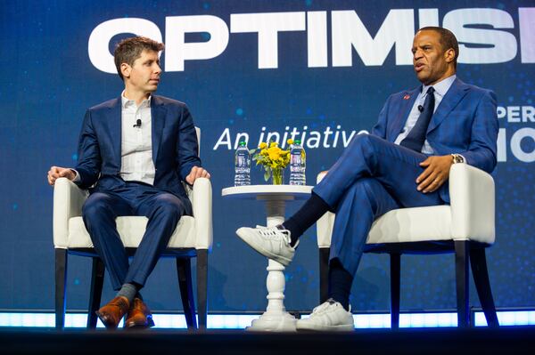 231211 ATLANTA, GA — From left, OpenAI CEO Sam Altman and founder and CEO of Operation HOPE John Hope Bryant speak at the HOPE Global Forums at the Hyatt Regency in downtown Atlanta on Monday, Dec. 11, 2023. 
(Bita Honarvar for The Atlanta Journal-Constitution)