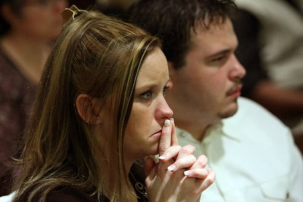 Kiley Barnes, the daughter of slain Fulton County Judge Rowland Barnes, listens to testimony from retired Fulton County Deputy Grantley White as he takes the stand for the second day.