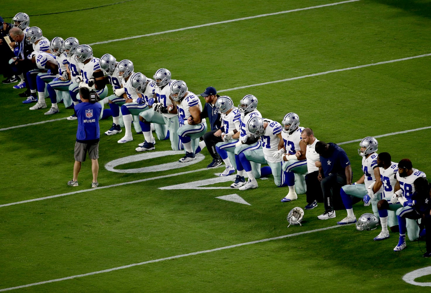 Photos: Falcons, other NFL teams show solidarity during National Anthem