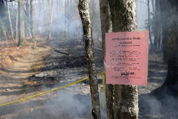 ovember 22, 2016, Tate City: The Appalachian Trail is closed from Dicks Creek Gap, GA., to Rock Gap, N.C., seen at the northern head of the Rock Mountain Fire on Tuesday, Nov. 22, 2016, north of Tate City. Curtis Compton/ccompton@ajc.com