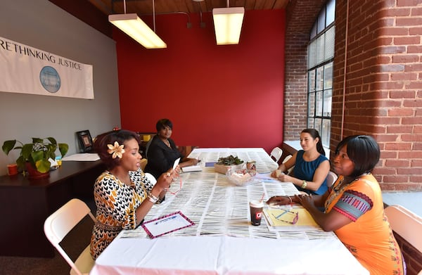 Staff members of Atlanta/Fulton County Pre-Arrest Diversion Initiative (clockwise from left) Simaya Turner, Shedra Jones, Moki Macias and Robby Ivy. HYOSUB SHIN / HSHIN@AJC.COM