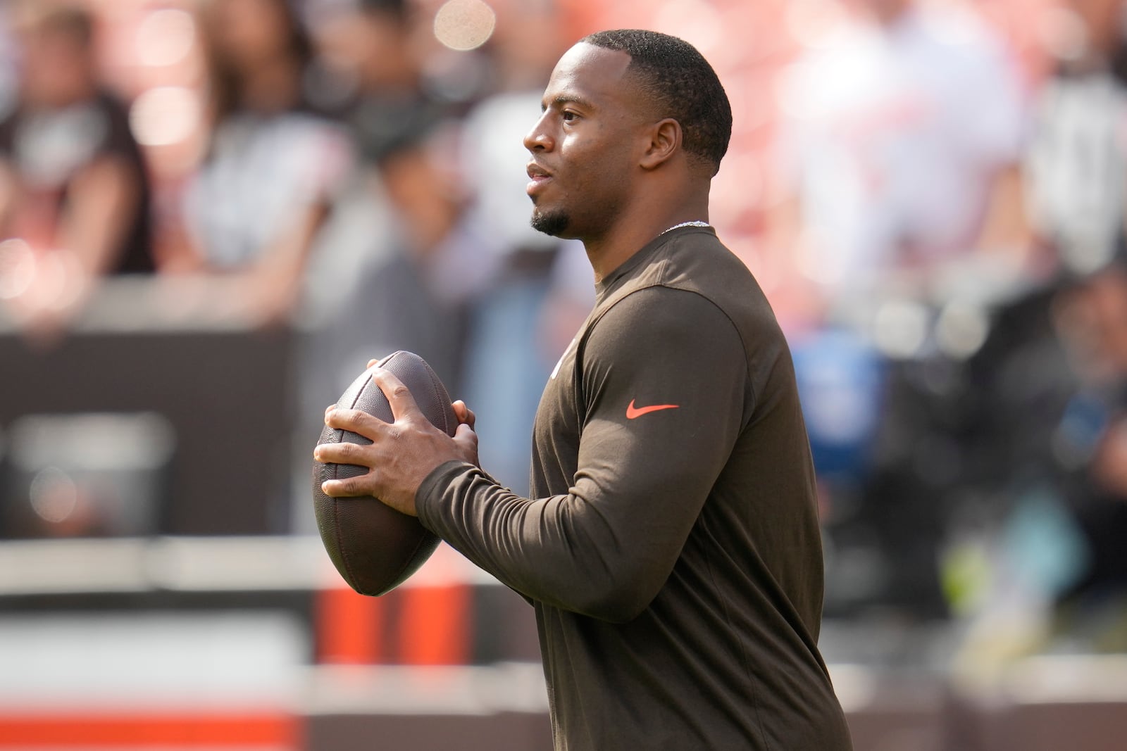 FILE - Injured Cleveland Browns running back Nick Chubb before an NFL football game against the New York Giants Sunday, Sept. 22, 2024, in Cleveland. (AP Photo/Sue Ogrocki, File)