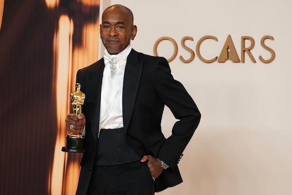 Paul Tazewell, winner of the award for best costume design for "Wicked," poses in the press room at the Oscars on Sunday, March 2, 2025, at the Dolby Theatre in Los Angeles. (Photo by Jordan Strauss/Invision/AP)