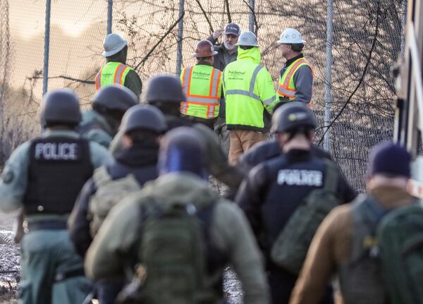 Law enforcement and construction contractors were on hand earlier this month at the site of a proposed police training center to be used by the the Atlanta Police Department, the Atlanta Fire Rescue Department to train their personnel. (John Spink/ The Atlanta Journal-Constitution)

