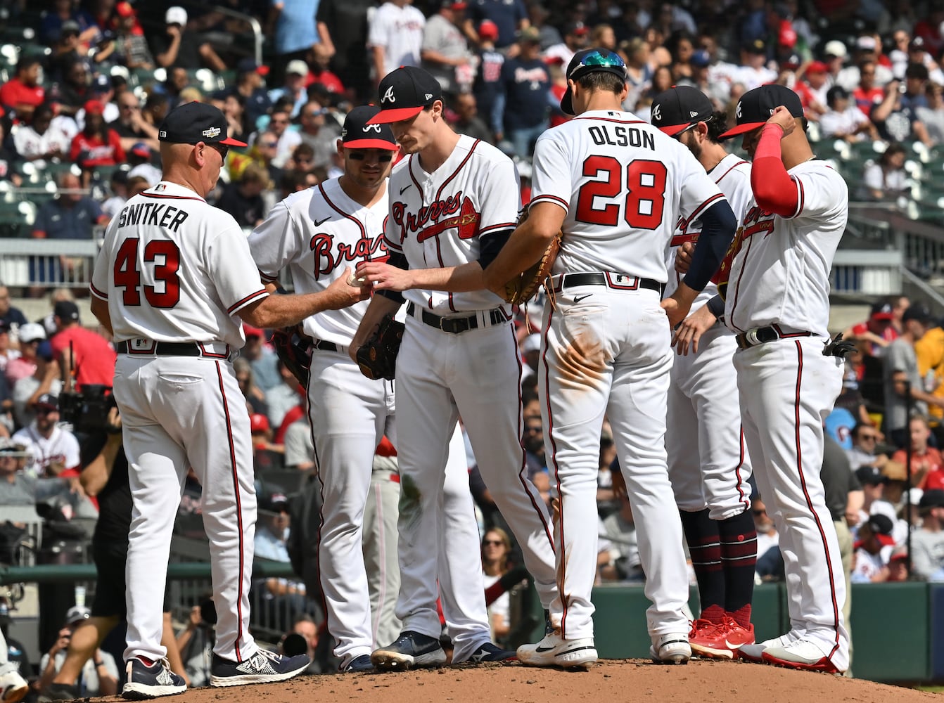 Atlanta Braves' Brian Snitker removes starting pitcher Max Fried during the fourth inning of game one of the baseball playoff series between the Braves and the Phillies at Truist Park in Atlanta on Tuesday, October 11, 2022. (Hyosub Shin / Hyosub.Shin@ajc.com)