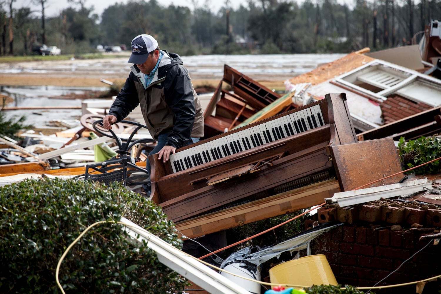 Strong storms in Georgia cause deaths, devastation