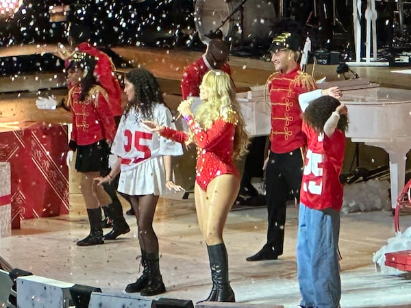 Mariah Carey at the end of her Christmas concert with her twins Monroe and Moroccan at State Farm Arena in Atlanta Nov. 23, 2024. RODNEY HO/rho@ajc.com