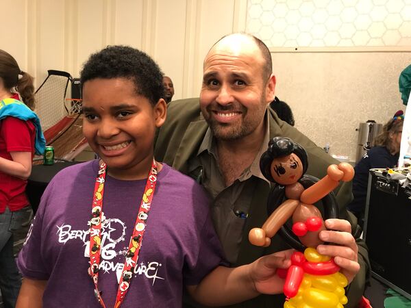  Balloon artist Avan Kroy with Bert's Big Adventure participant Zy Fagin, who has had a brain aneurysm. CREDIT: Rodney Ho/rho@ajc.com