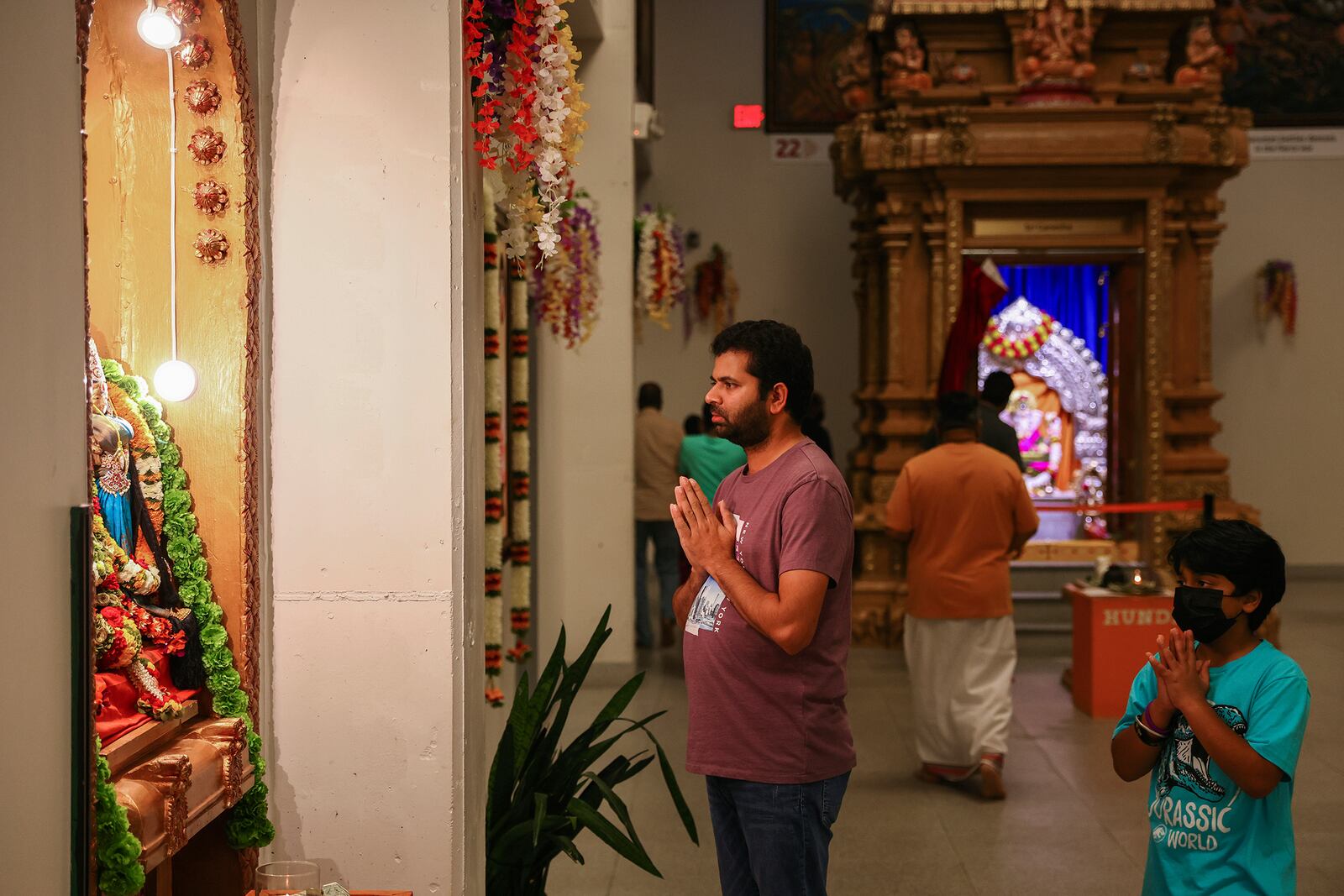 FILE - Worshippers pray at the Karya Siddhi Hanuman Temple in Frisco, Texas, Oct. 22, 2022, as worshippers celebrated Dhanteras, which is the first night of the Hindu holiday Diwali. (AP Photo/Andy Jacobsohn, File)