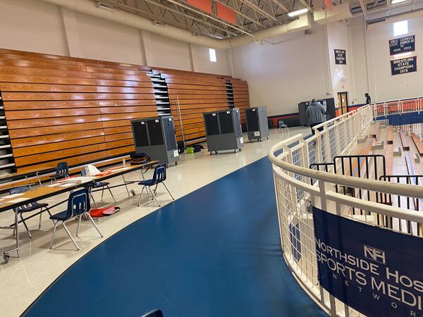 Voter check-in tablets weren’t delivered until hours after polls opened Tuesday at North Springs High School, forcing voters to use emergency paper ballots instead of touchscreen voting computers. But voting never stopped there, said Gabriel Sterling, chief operating officer for the secretary of state’s office. (Adrianne Murchison/AJC)