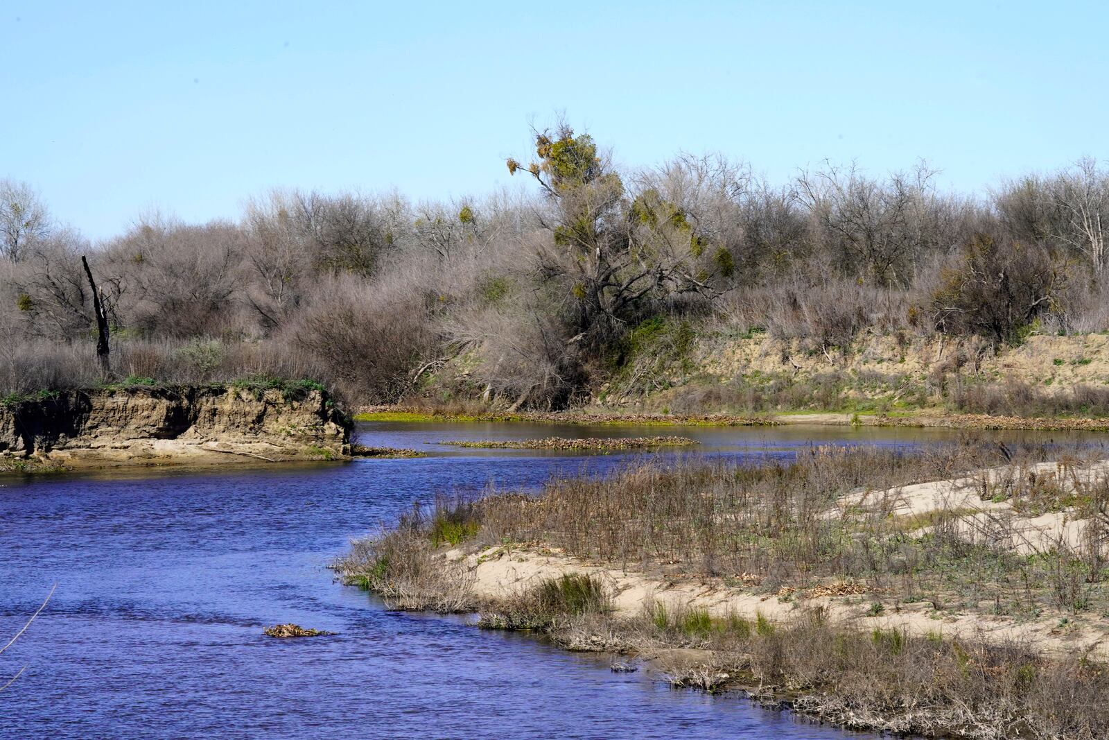 FILE - The Tuolumne and San Joaquin rivers meet on the edge of the Dos Rios Ranch Preserve in Modesto, Calif., on Feb. 16, 2022. The area is in California's 13th Congressional District. (AP Photo/Rich Pedroncelli, File)