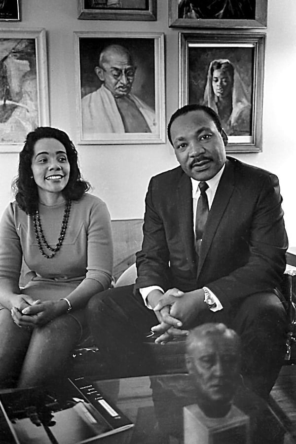 Coretta Scott King and Martin Luther King Jr. at home in Atlanta in March 1968. A painting of Gandhi hangs in the background, and a bust of FDR is on the coffee table.