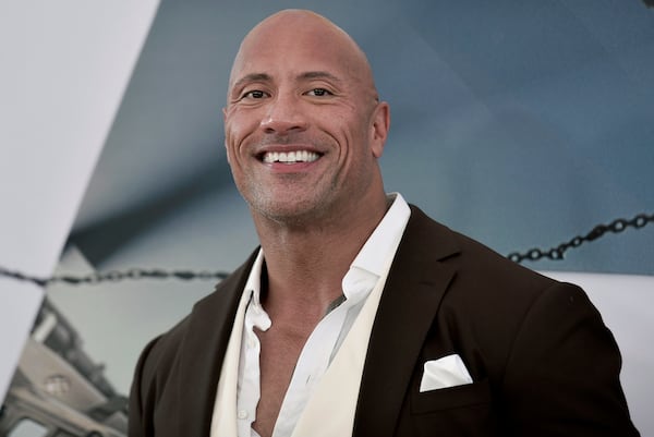 Dwayne Johnson announced he and his wife, Lauren Hashian, and their two young daughters tested positive for the coronavirus.