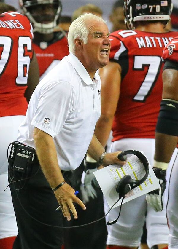 "Play with composure!" Smitty whispers. (Curtis Compton/AJC)